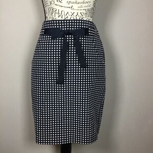 Navy blue polka dot skirt with pockets business 1950s tie front sz 6 waist 32”